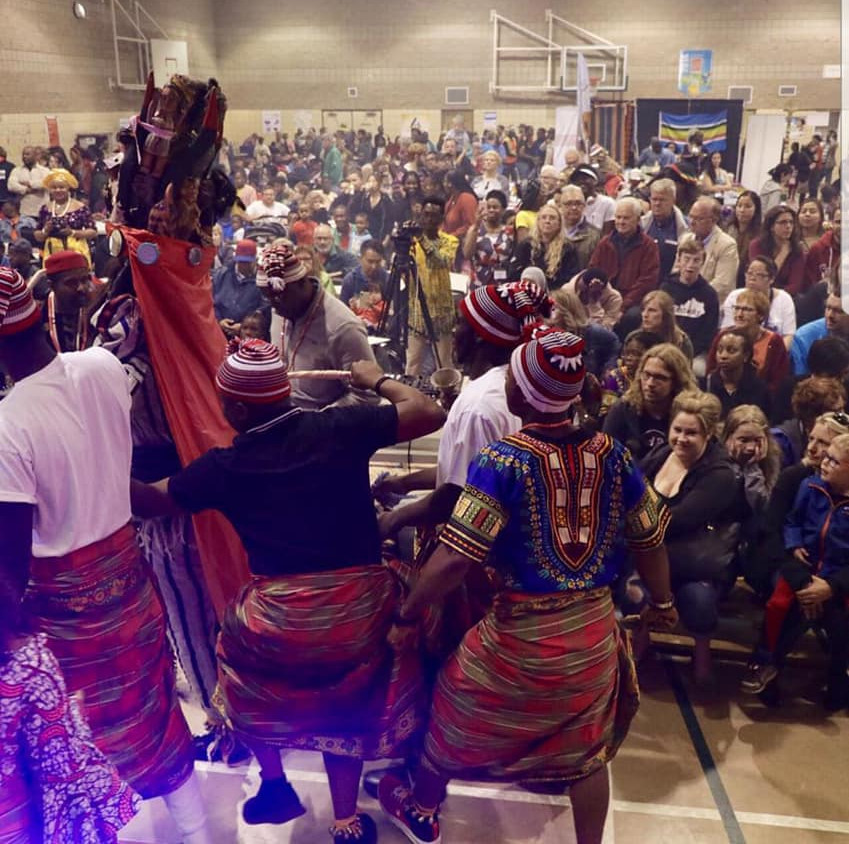 Igbo Masquerade Shakes Mosaic in Regina